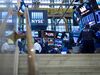 Traders work on the floor of the New York Stock Exchange.