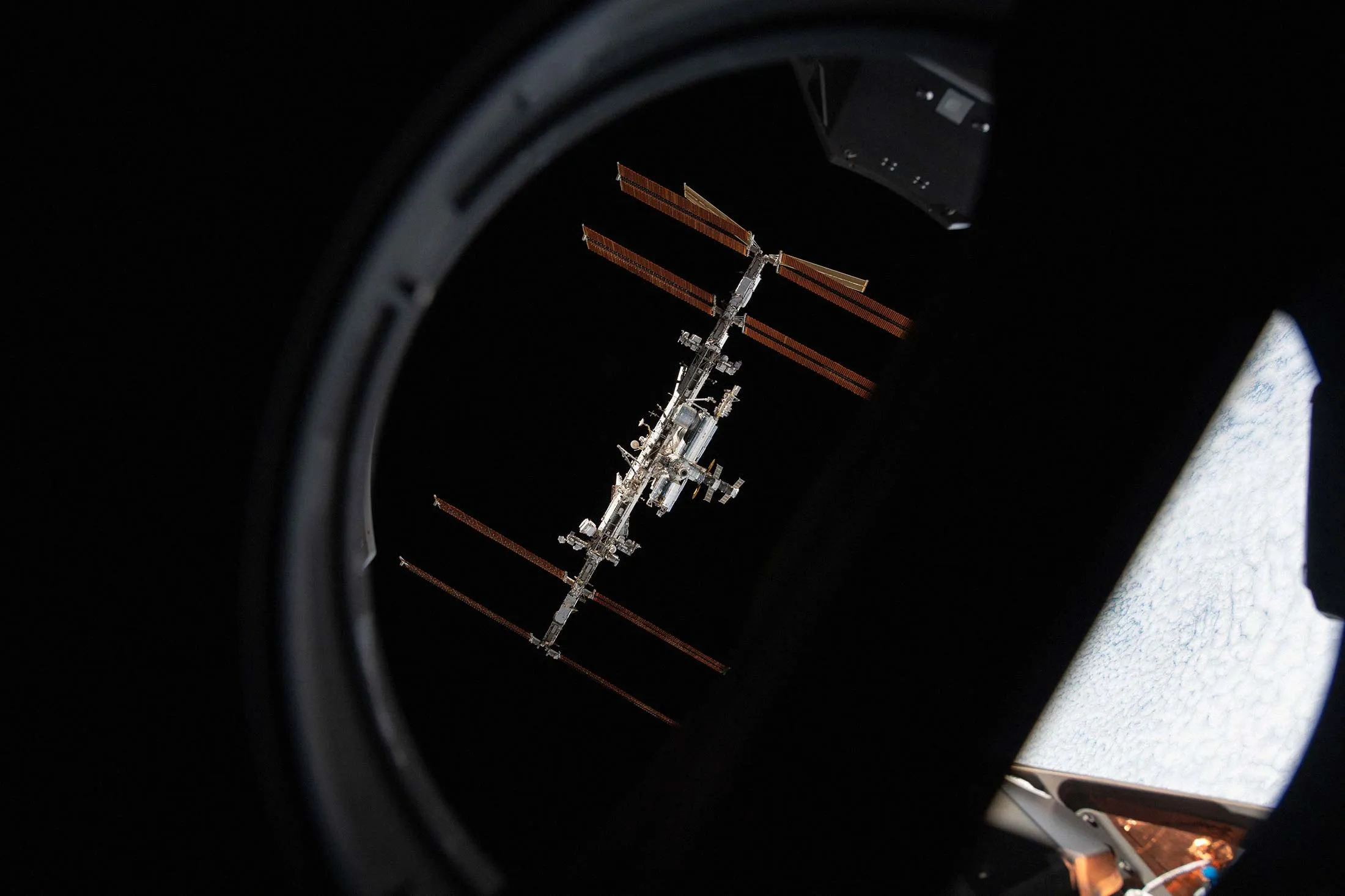 The International Space Station, pictured from a window on the SpaceX Crew Dragon Endeavour on Nov. 8, 2021.