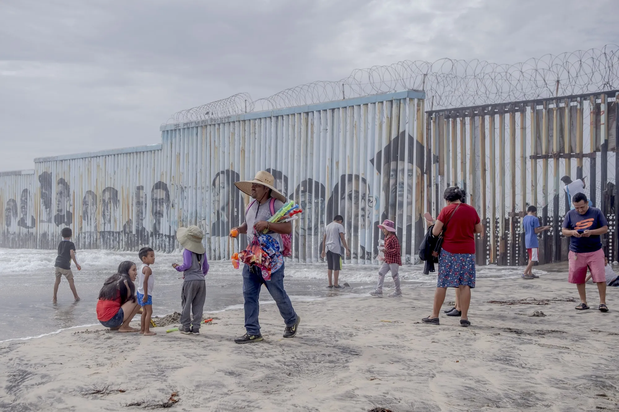 A vendor sells merchandise on a beach near&nbsp;the Mexico and US border fence in Tijuana, Mexico&nbsp;on August 7.