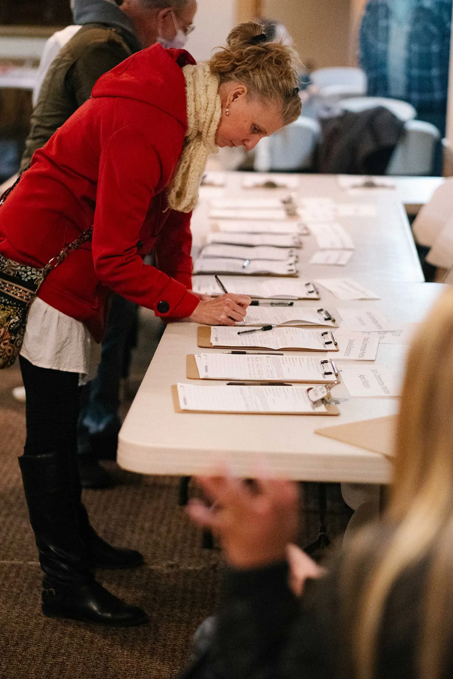 Residents of Pennsylvania’s 7th Congressional District sign a series of petitions, during what’s known as a Petition Party, at the Grover Cleveland Democratic Association in Bethlehem, Pennsylvania on Wednesday, February 25, 2026. Carol Obando Derstine, a Democratic candidate running to represent Pennsylvania’s 7th Congressional District, and a former employee of PPL Electric and Utilities from 2016 to 2025, is hoping to get enough signatures to be on the ballot for the primaries to run against the incumbent, Republican Ryan Mackenzie.  Photographer: Michelle Gustafson for Bloomberg Markets