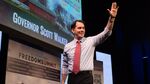 Scott Walker, governor of Wisconsin, waves to the crowd during the Iowa Freedom Summit in Des Moines, Iowa, U.S., on Saturday, Jan. 24, 2015.
