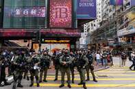 Protests Flare Up as Hong Kong Leader Declares Return to Stability on Tense Holiday