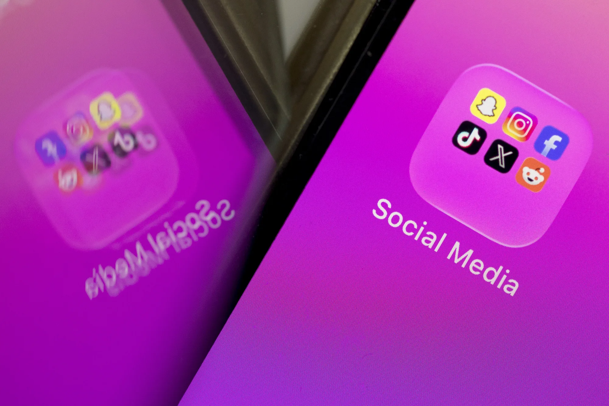 The Snapchat, Instagram, Facebook, TikTok, X and Reddit apps on a smartphone.