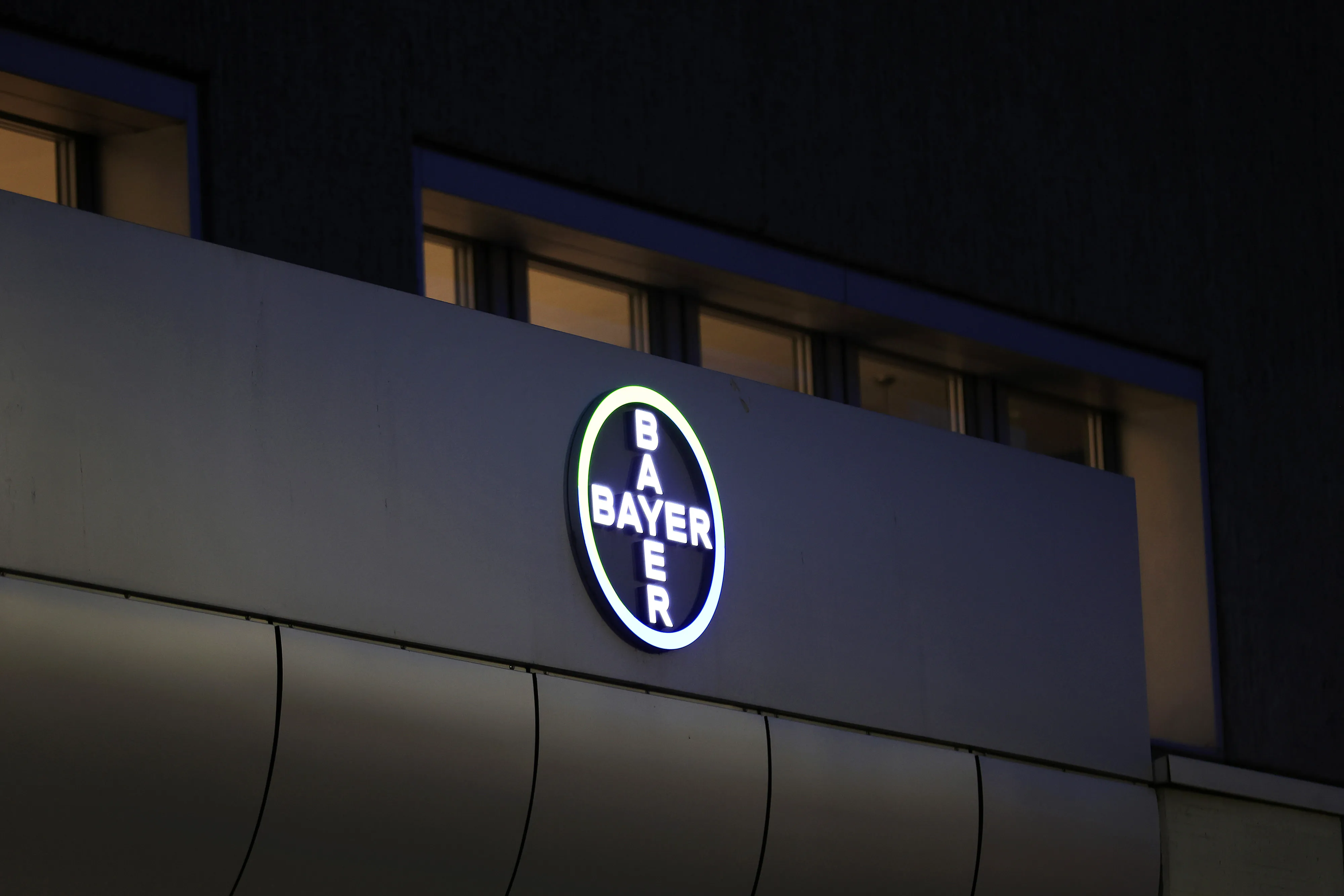 The logo of Bayer AG at the company’s pharmaceutical campus in Berlin, Germany, on Monday, Feb. 27, 2023.