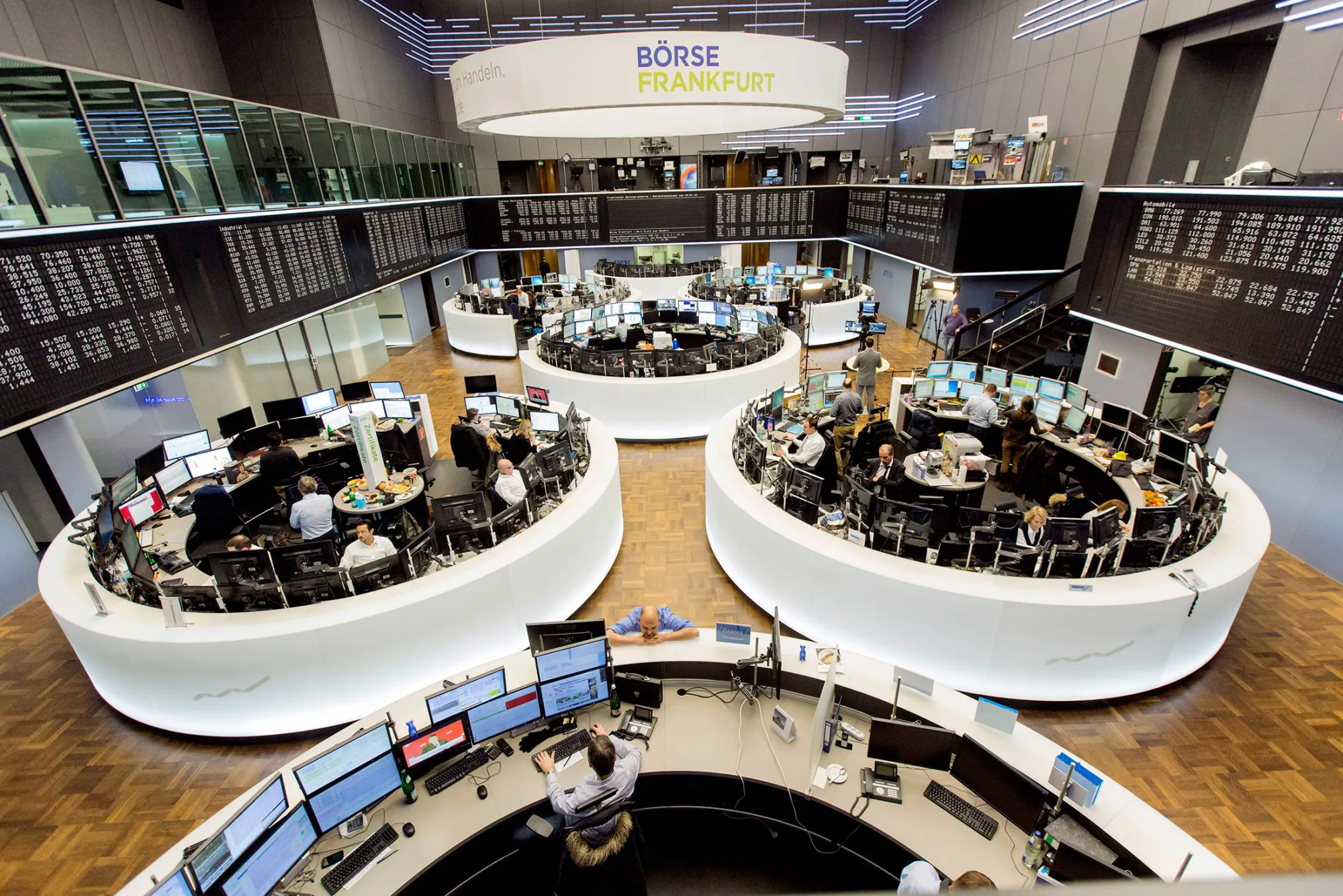 Financial traders monitor data inside the Frankfurt Stock Exchange in Frankfurt.
