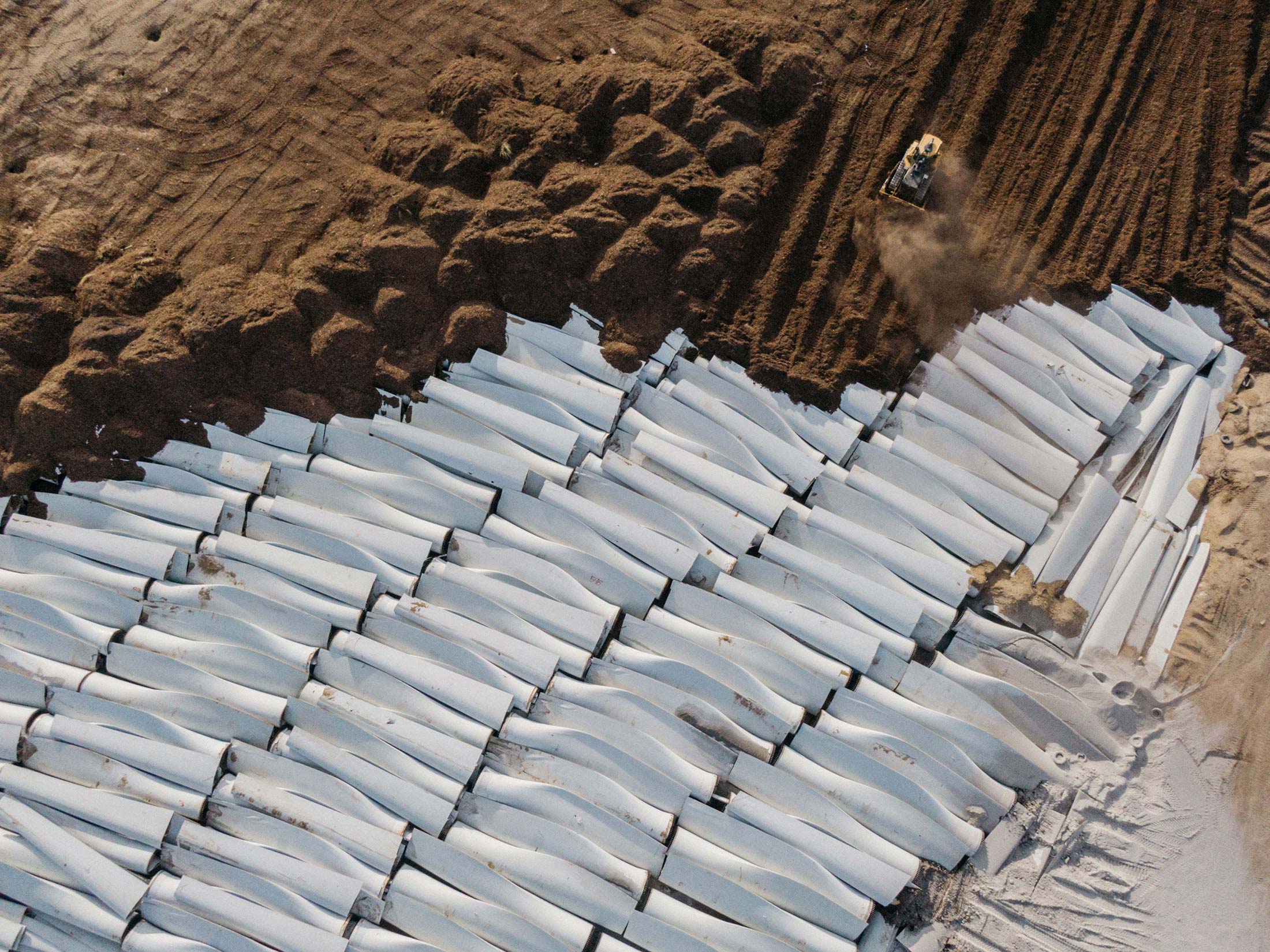 Fragments of wind turbine blades await burial at the Casper Regional Landfill in Wyoming.