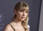 This Nov. 24, 2019 file photo shows Taylor Swift at the American Music Awards in Los Angeles. Swift's “All Too Well: A Short Film,&quot; premiering online on Friday evening, has fans reveling in the juicy details of a break-up from the pop star's past. (Photo by Jordan Strauss/Invision/AP, File)