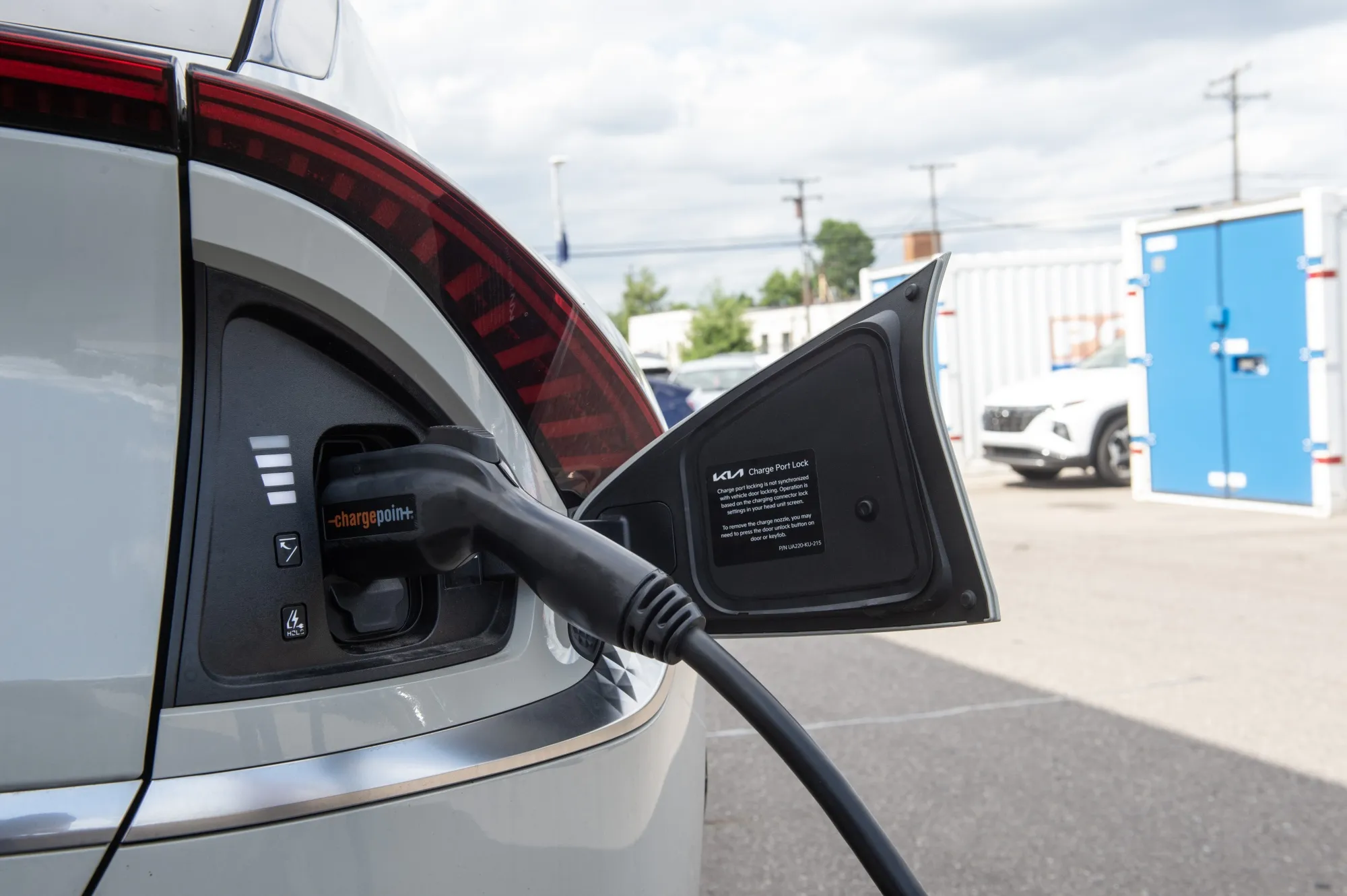 An electric vehicle is charged at a dealership in Detroit.