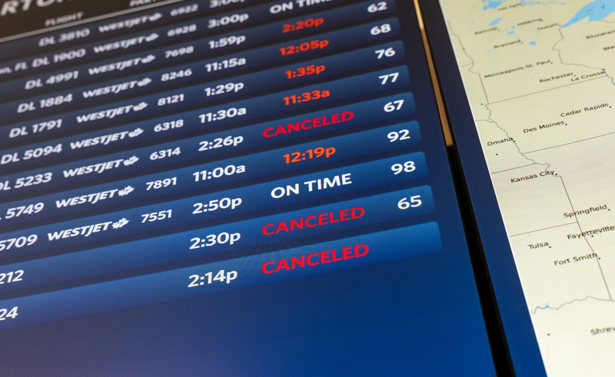 An information board shows delayed and canceled flights at LaGuardia Airport, on Nov. 10.