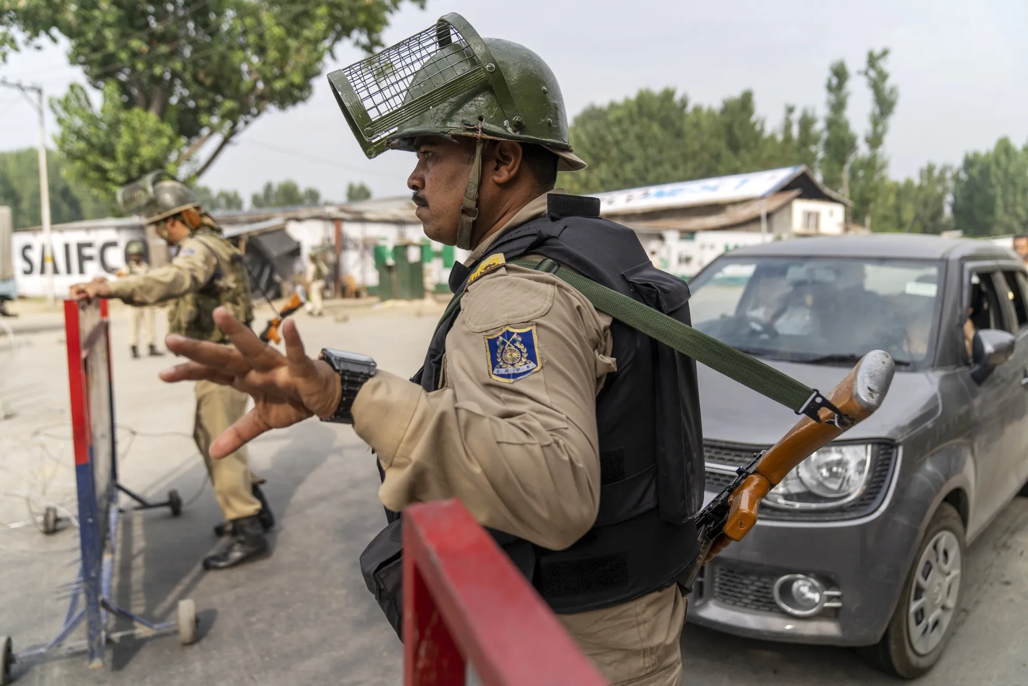 Members of the Central Reserve Police Force (CRPF) blockade a road in the Old Town of Srinagar, Jammu and Kashmir, India, on Aug. 30, 2019. H