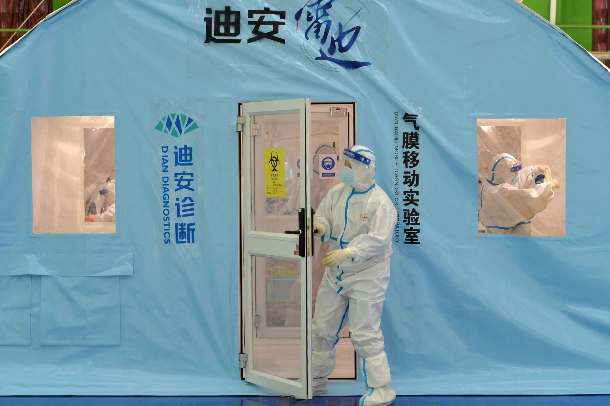 A staff member at a temporary Covid-19 testing facility in Tianjin on Jan. 11.