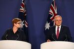 Scott Morrison and foreign minister Marice Payne during a news conference announcing the travel ban on Feb. 1. 