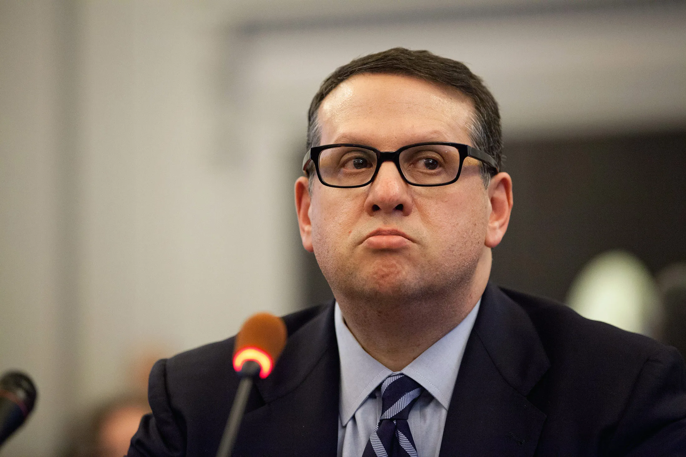 David Wildstein, former director of Interstate Capital Projects for the Port Authority of New York and New Jersey, listens during a hearing at the State Assembly in Trenton, New Jersey, U.S., on Thursday, Jan. 9, 2014. Wildstein, the appointee of Governor Chris Christie at the center of a controversy over lane closures in Fort Lee, invoked his right to remain silent at a legislative hearing.
