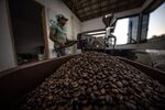 A worker roasts coffee beans at a facility in Caconde, Sao Paulo state, Brazil.