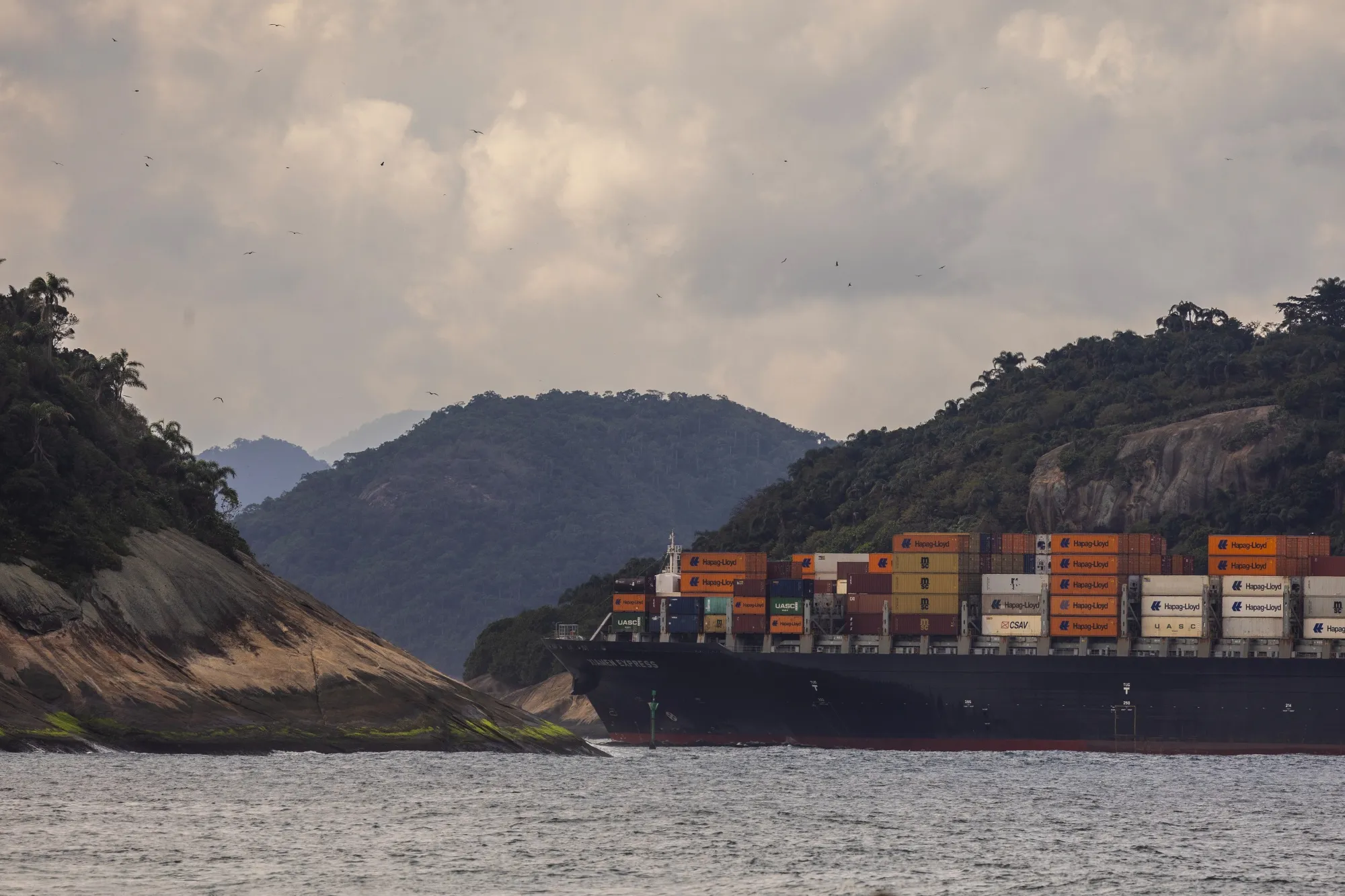 A container ship travels towards the Port of Rio de Janeiro&nbsp;on Thursday.