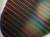 Renesas Electronics Corp.'s 300mm wafer for mobile phones is displayed at the company's Naka plant in Hitachinaka city, Ibaraki prefecture, Japan, on Wednesday, April 27, 2011. Renesas Electronics Corp., the world's biggest maker of microcontrollers used in cars, mobile phones and cameras, may complete inspections at its shuttered Naka plant in Ibaraki, Japan, ahead of schedule, plant manager Takashi Aoyagi said at the factory today.