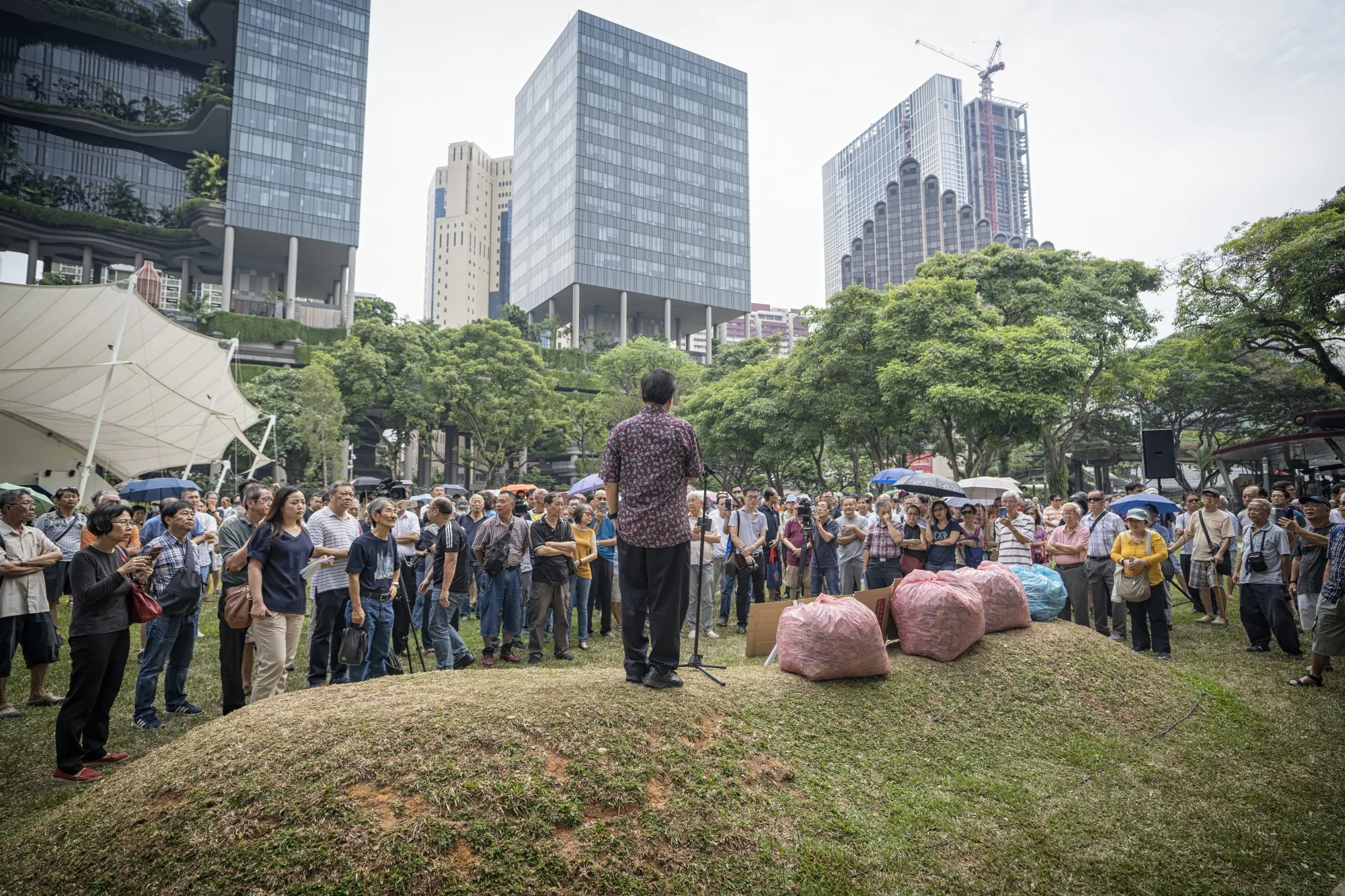 People gather during a protest on Hyflux’s debt restructuring plan.