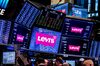 Monitors display Levi Strauss & Co. signage during the company's initial public offering (IPO) in New York, U.S., on Thursday, March 21, 2019. Levi Strauss & Co. rose as much as 35 percent in its return as a public company, in the biggest test so far this year of a slow-to-warm-up market for U.S. listings.