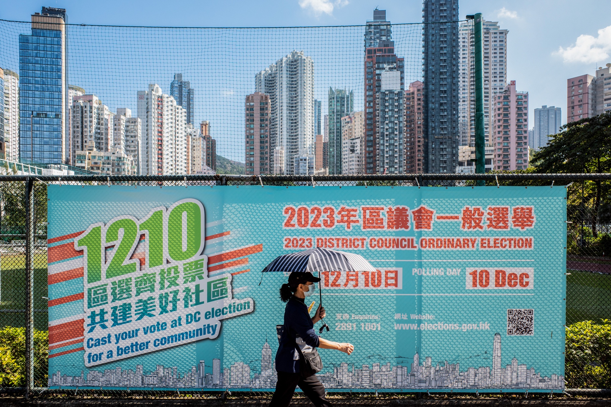 HK Regulators Urge Public to Vote in ‘Patriots Only’ Election - Bloomberg