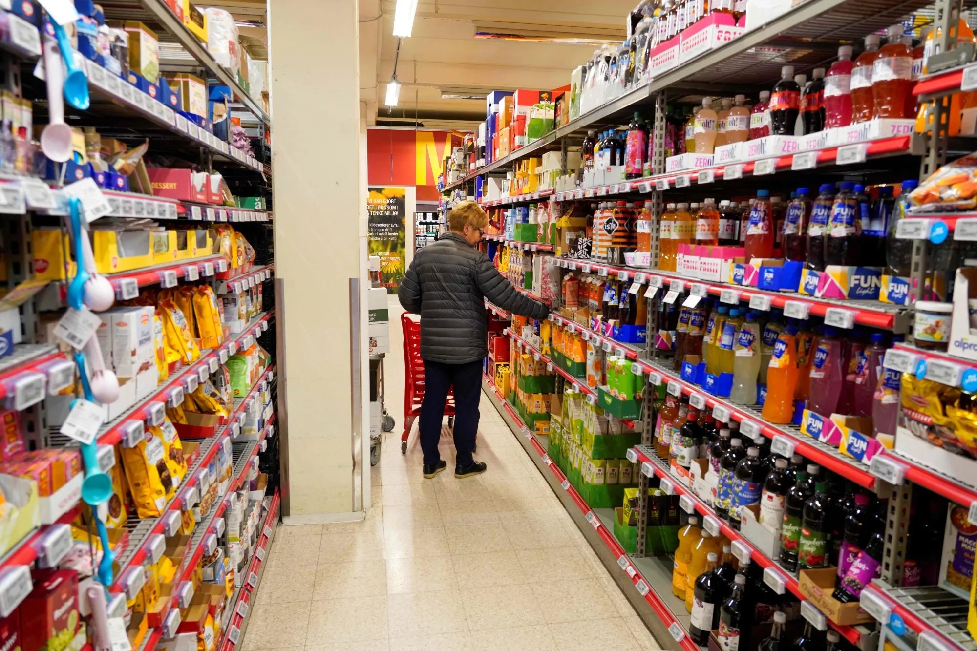 A customer&nbsp;shops&nbsp;inside the grocery store in Kongsberg, Norway.
