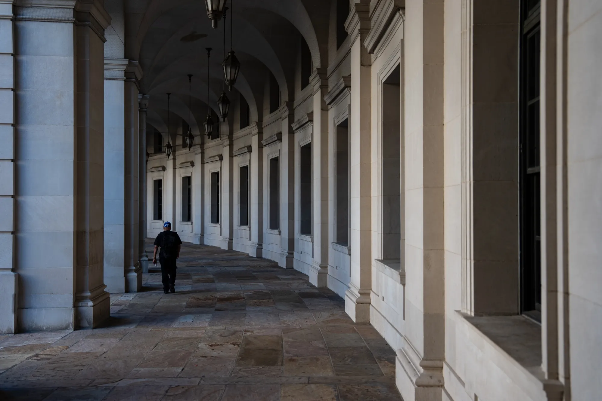 A commuter near the William Jefferson Clinton Federal Building in Washington.