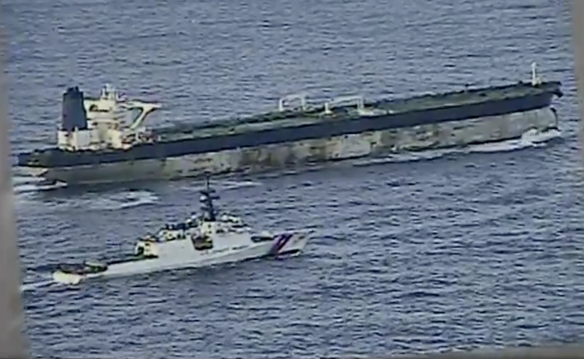 A US Coast Guard ship approaches the Bella 1 tanker in the North Atlantic, in a video released on Jan. 7.