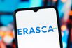 In this photo illustration, the Erasca logo is seen