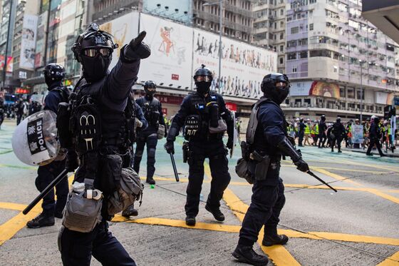 Hong Kong Policeman Who Fired His Gun Now Faces Death Threats