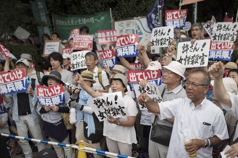 Anti-U.S. airbase demonstrators protest in front of the Japanese Parliament in Tokyo, Japan on June 19.
