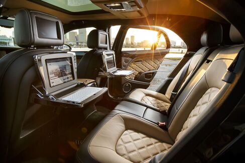 The rear of the car is where it really shines: Quilted massaging seats recline or tilt forward so you can use the computer and media system.