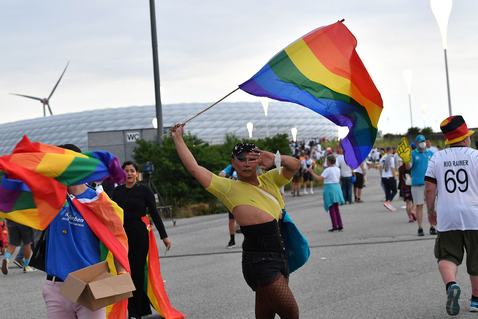 Germany fans wave Rainbow flags outside the Allianz Arena ahead of match Germany and Hungary, in Munich, on June 23.