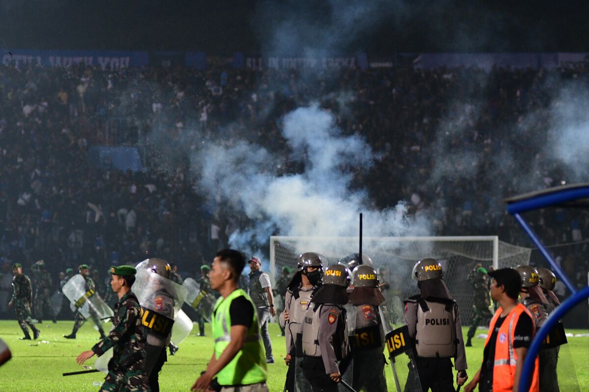 Tear gas launched by police in Indonesia, 2022.