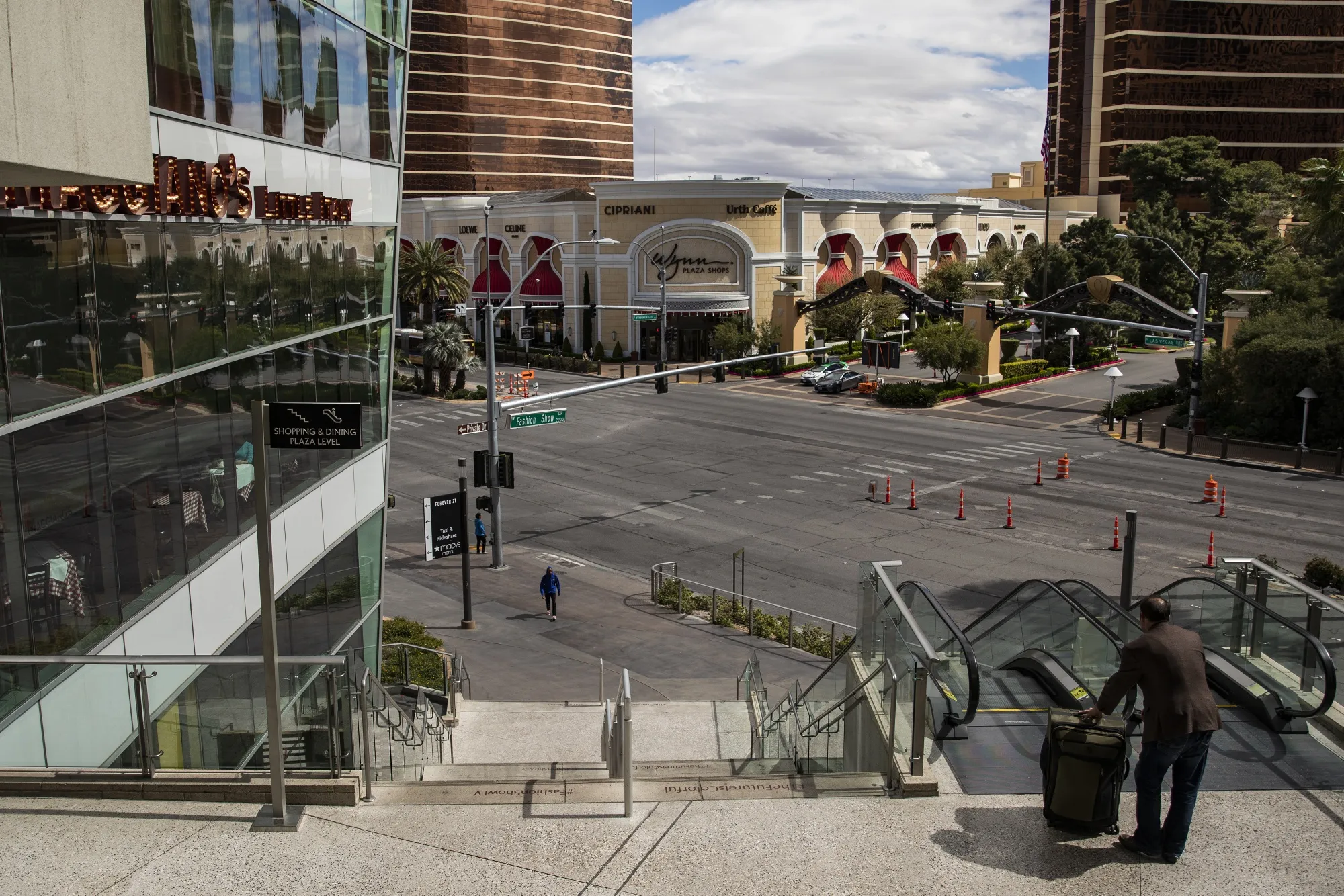Pedestrians walk past the Fashion Show Mall on the Las Vegas Strip in Las Vegas, Nevada, U.S., on&nbsp;March 17.