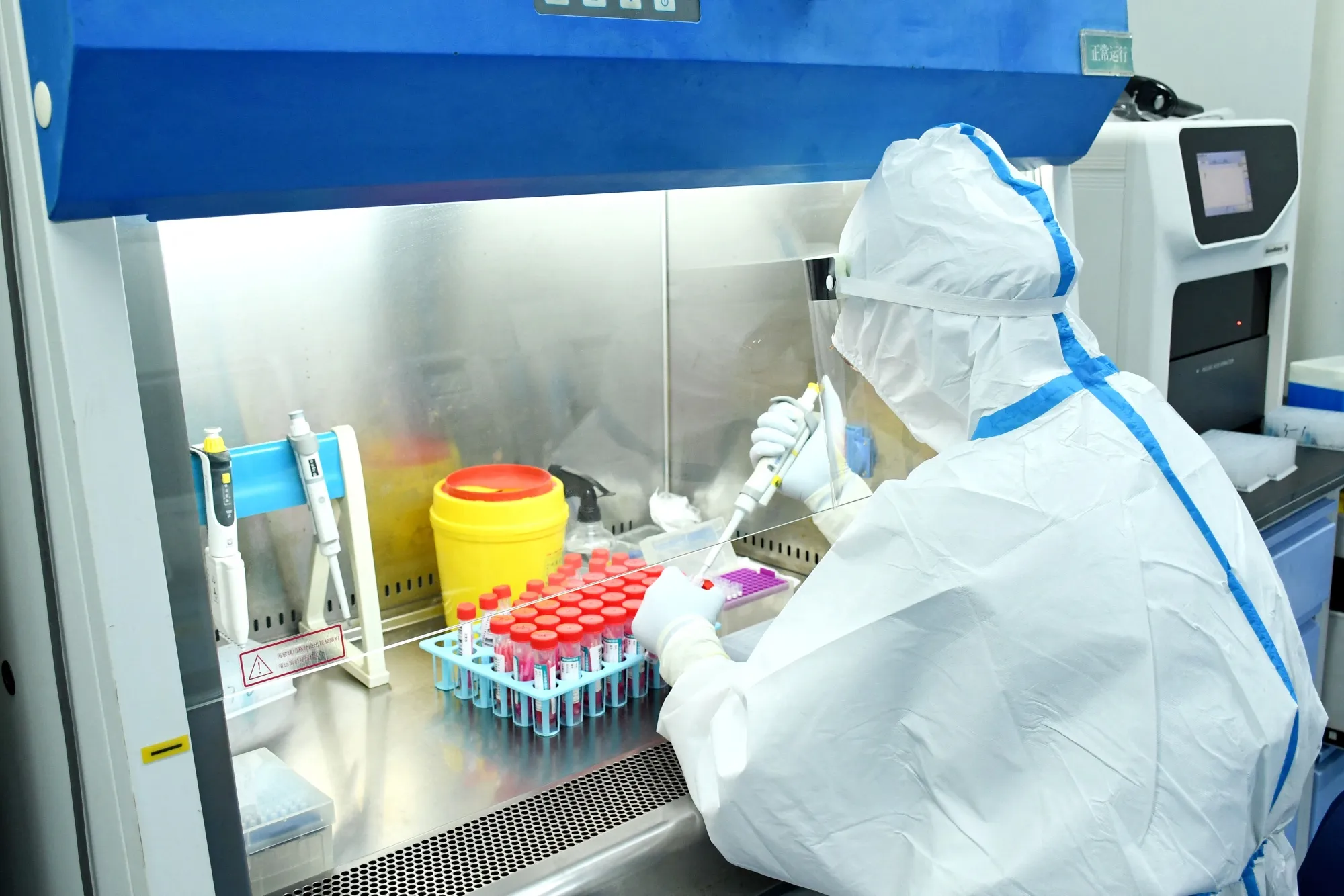 A laboratory technician at a Covid-19 testing facility in Dingxi, in China’s northwestern Gansu province. 
