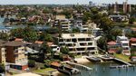 Houses stand in Sydney, Australia, on Wednesday, Feb. 17, 2016. Australia's opposition Labor Party is proposing scaling back tax breaks for landlords that have helped fuel a 50 percent increase in property prices in capital cities since 2008.
