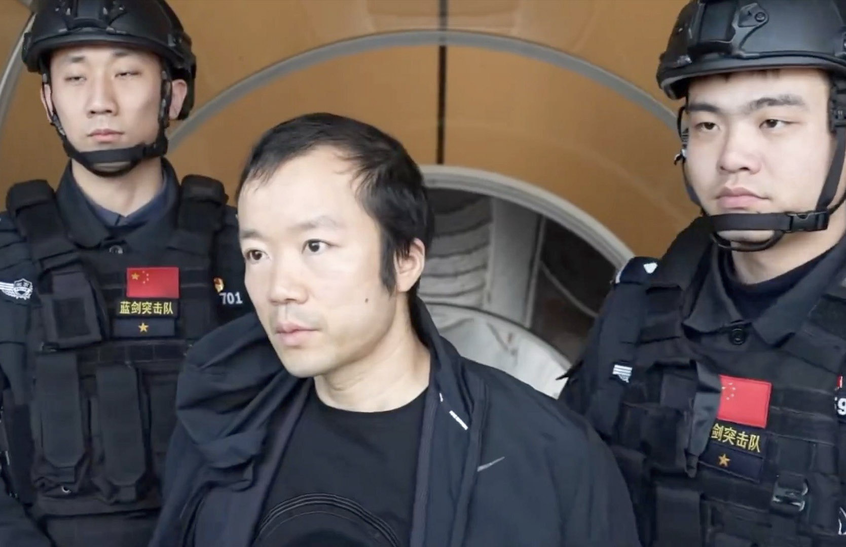 A still image from video footage broadcast by China's state television network CCTV shows Chen Zhi being extradited from Cambodia to China on Jan. 7. Source: EyePress News/Shutterstock