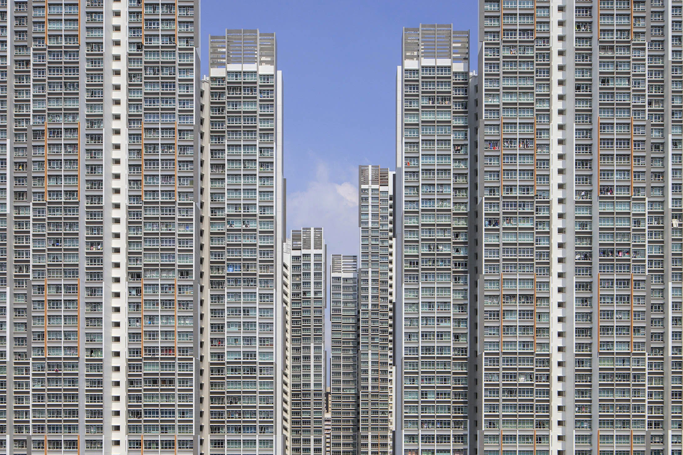 Public housing stands in the Ghim Moh district of Singapore, on Friday, June 26, 2015. Singapore is scheduled to release home price data on July 1. Singapore's home prices dropped for a seventh consecutive quarter, the longest losing streak in 13 years, as tighter mortgage curbs cooled demand in Asia's second-most expensive housing market.
