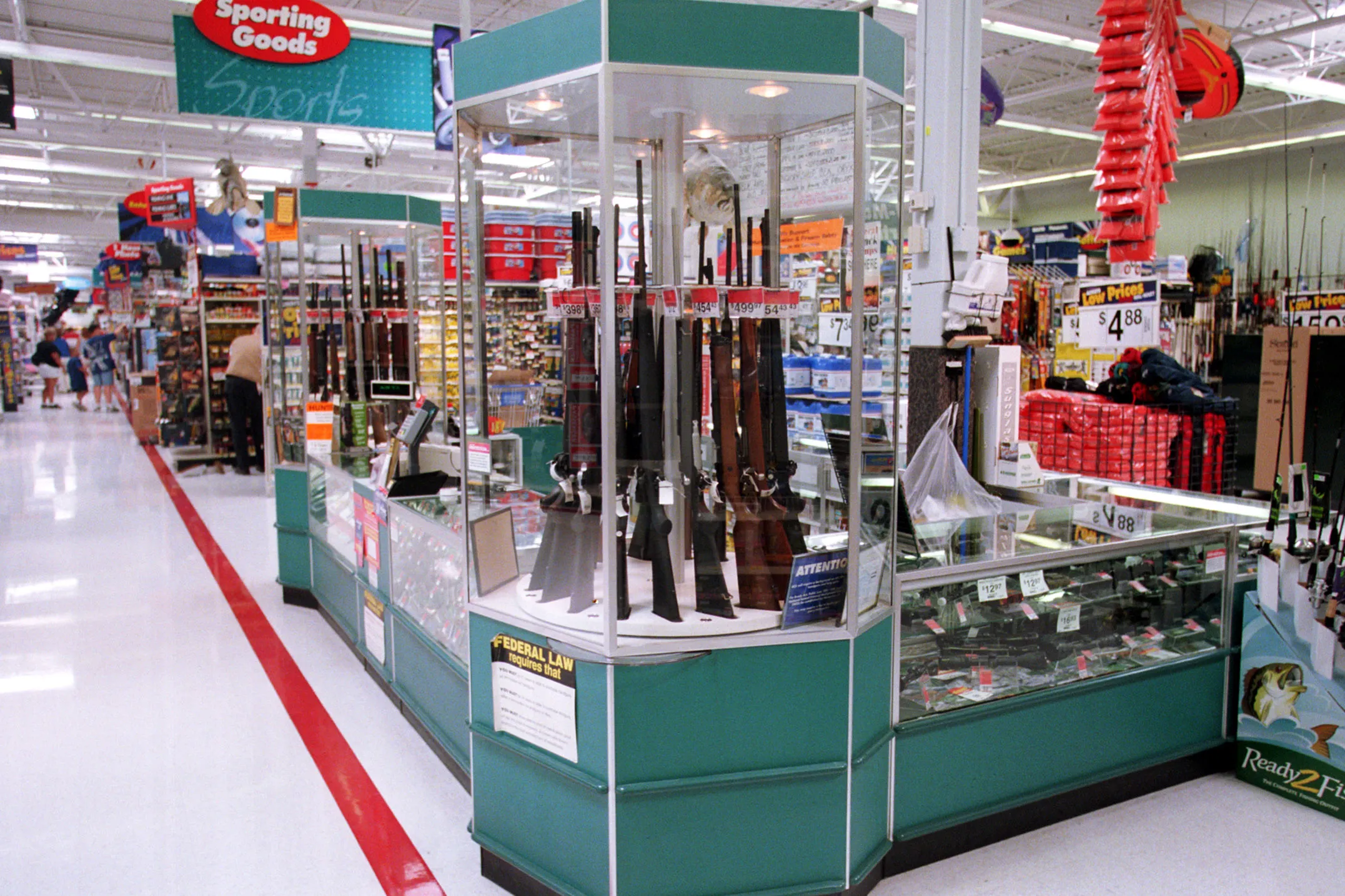 Firearms displayed for sale at a Walmart.