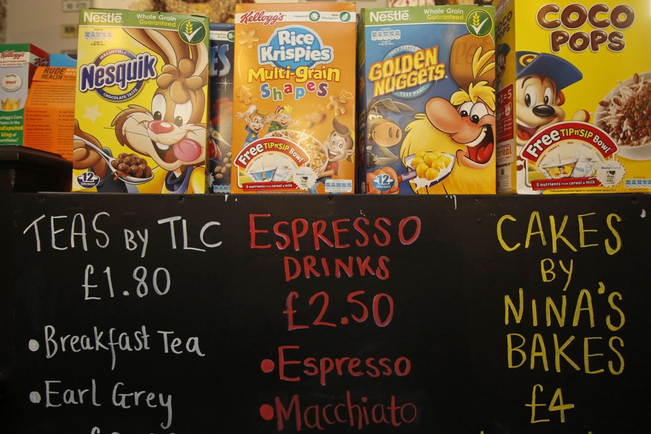 Boxes of cereal and a menu board are seen at the &quot;Cereal Killer Cafe&quot; in East London.