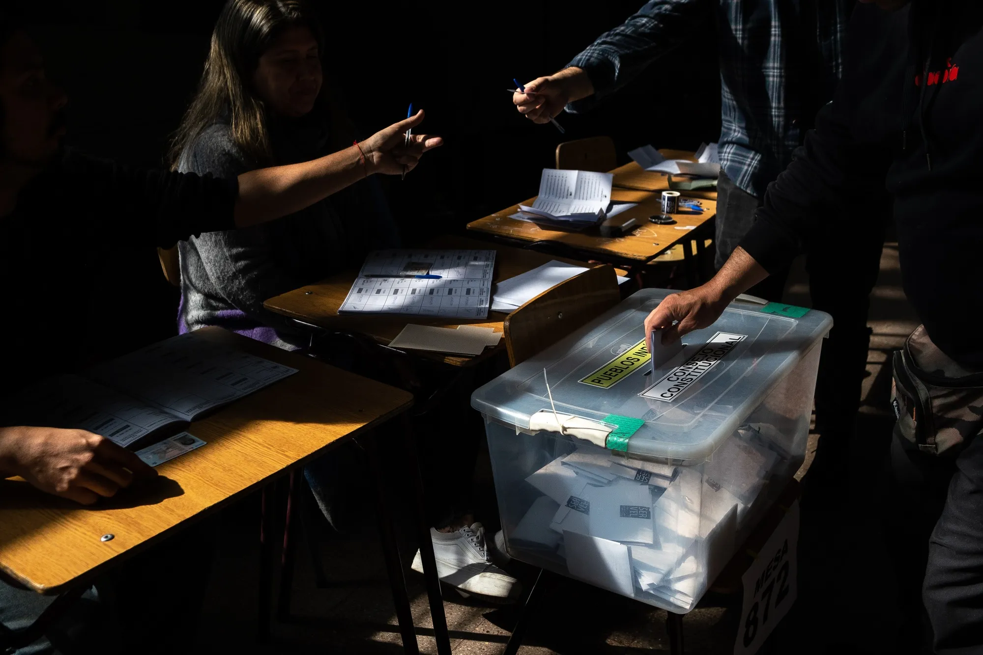 A voter casts a ballot at a polling station during the Constitutional Council elections in Santiago, Chile, on May 7.