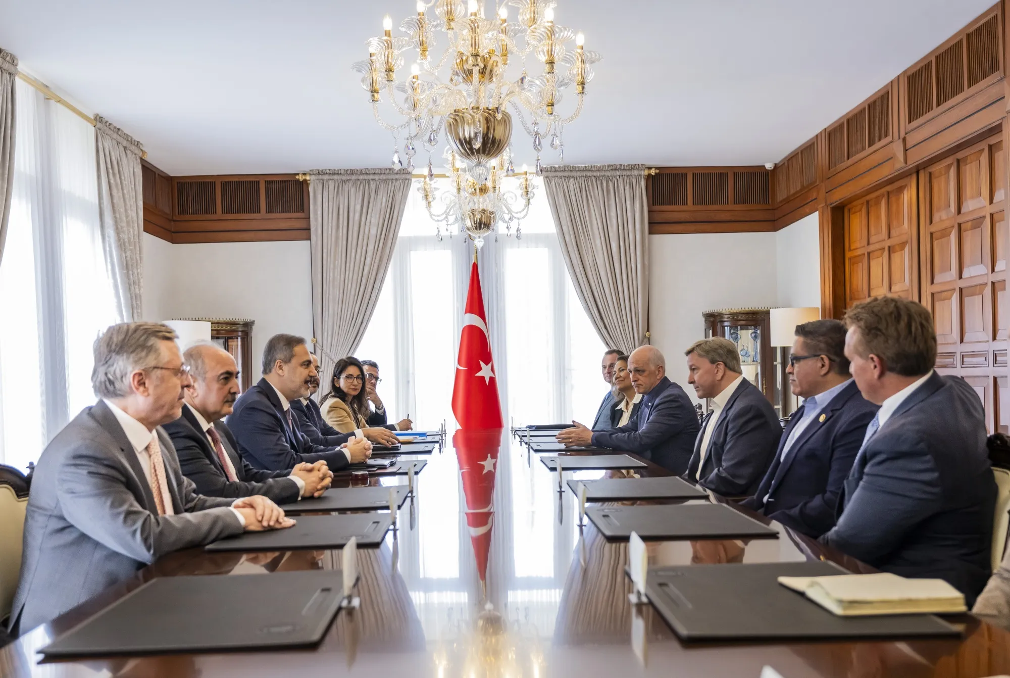 Hakan Fidan, third left, meets with Mike Rogers and Adam Smith in Ankara&nbsp;on March 28.