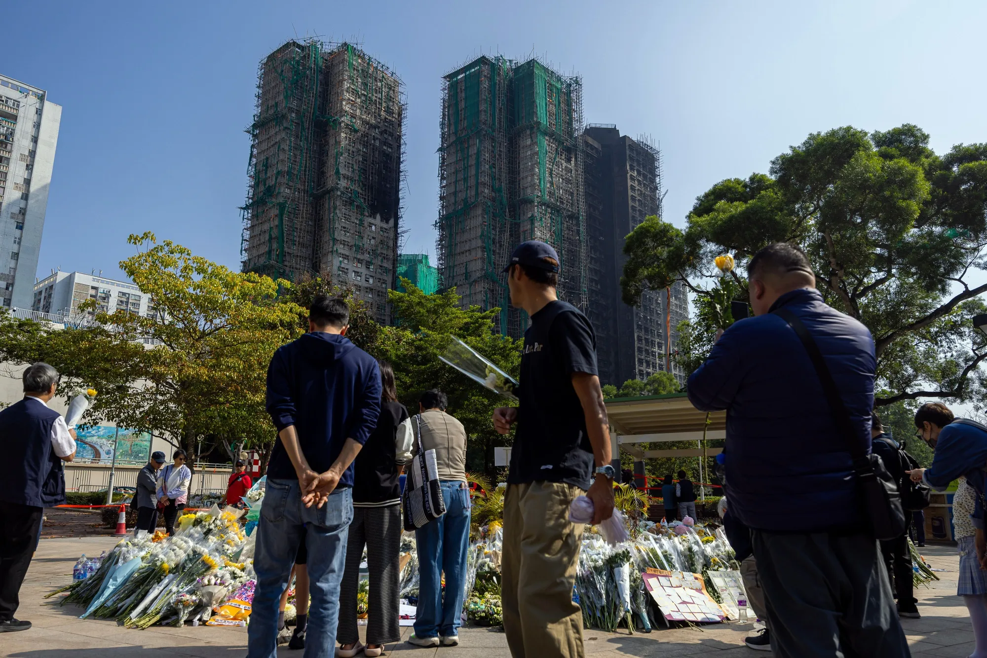 Floral tributes for victims of the fire at Wang Fuk Court residential estate in Tai Po district in Hong Kong.