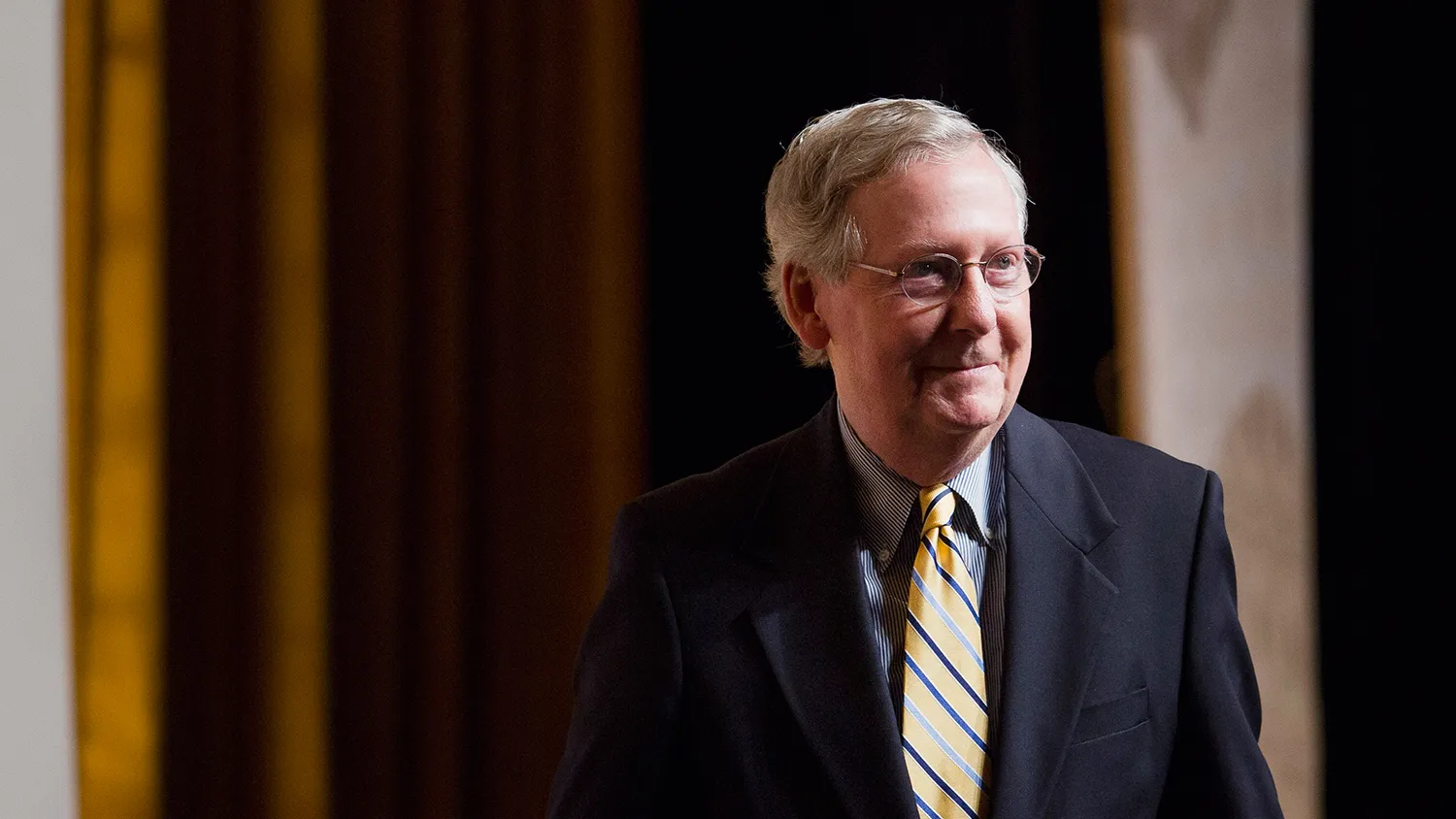 Senate Majority Leader Mitch McConnell, a Republican from Kentucky, exits the stage after speaking during the Faith and Freedom Coalition's "Road to Majority" conference in Washington, D.C., U.S., on Friday, June 19, 2015.
