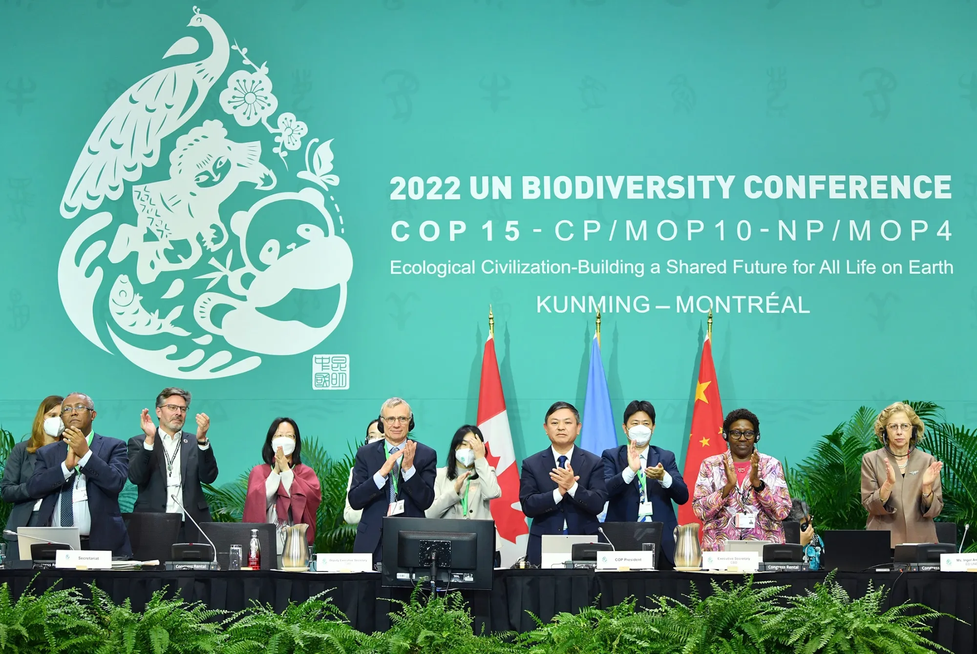 Participants applaud after the adoption of the Kunming-Montreal Global Biodiversity Framework, a United Nations deal aimed at reversing biodiversity loss, at COP15 in Montreal in December 2022.&nbsp;