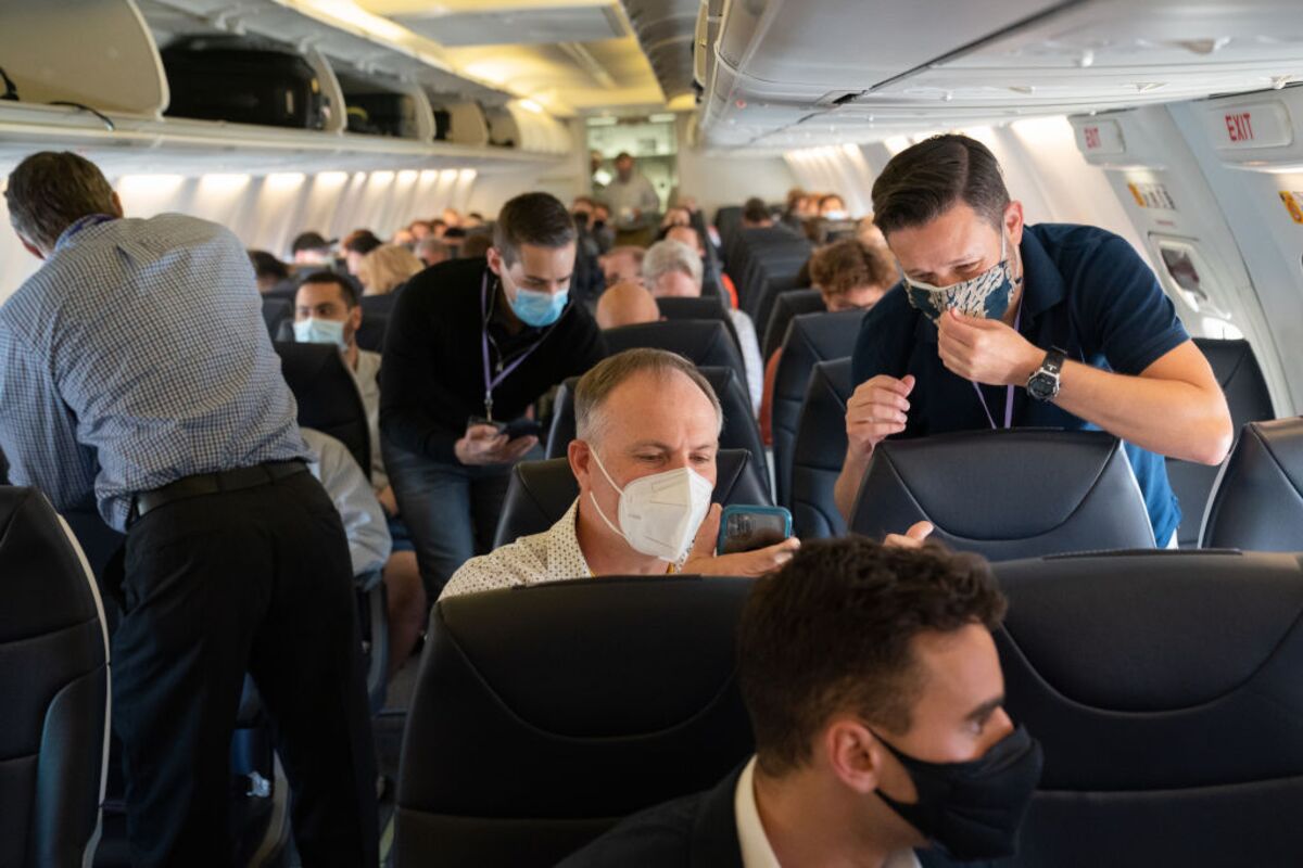 Yes, You Should Keep Wearing Face Masks on Airplanes Bloomberg