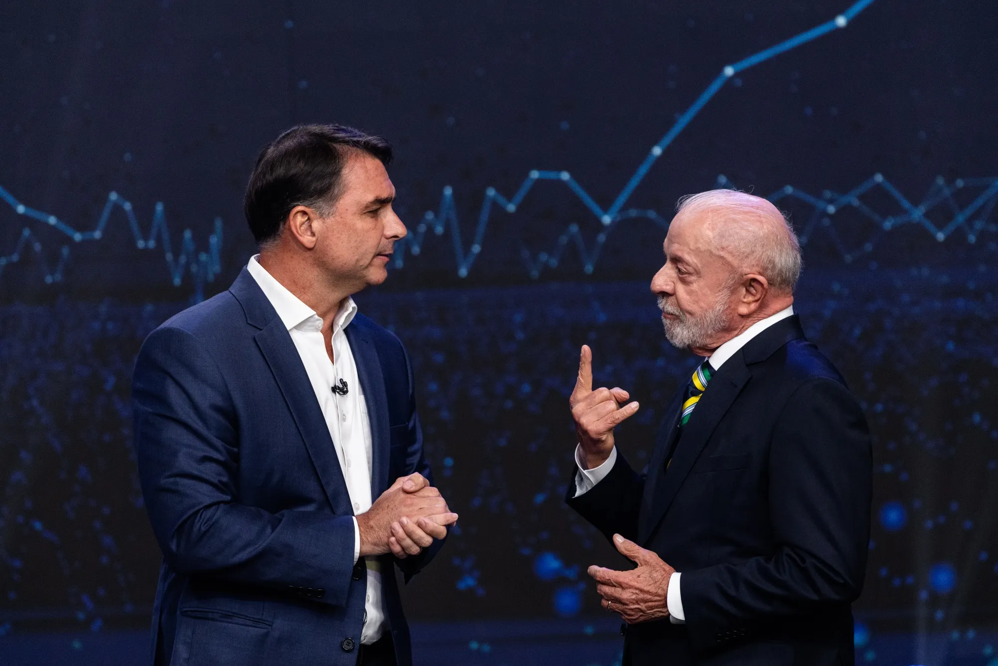 Flávio Bolsonaro, left, and Luiz Inácio Lula da Silva during a presidential debate on Sunday, Oct. 18.