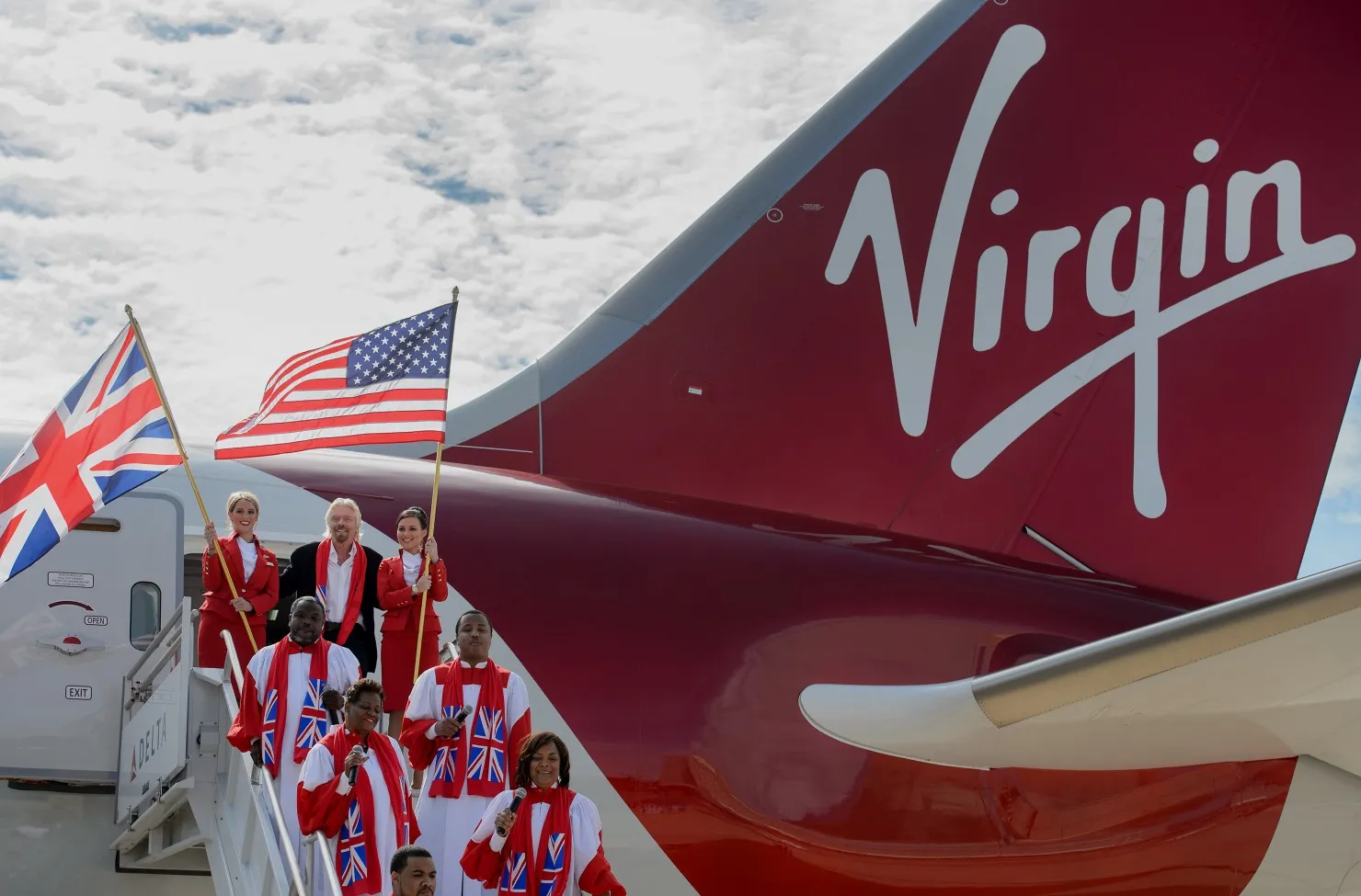 Richard Branson exits a Boeing 787 at Atlanta Hartsfield-Jackson airport in 2014.