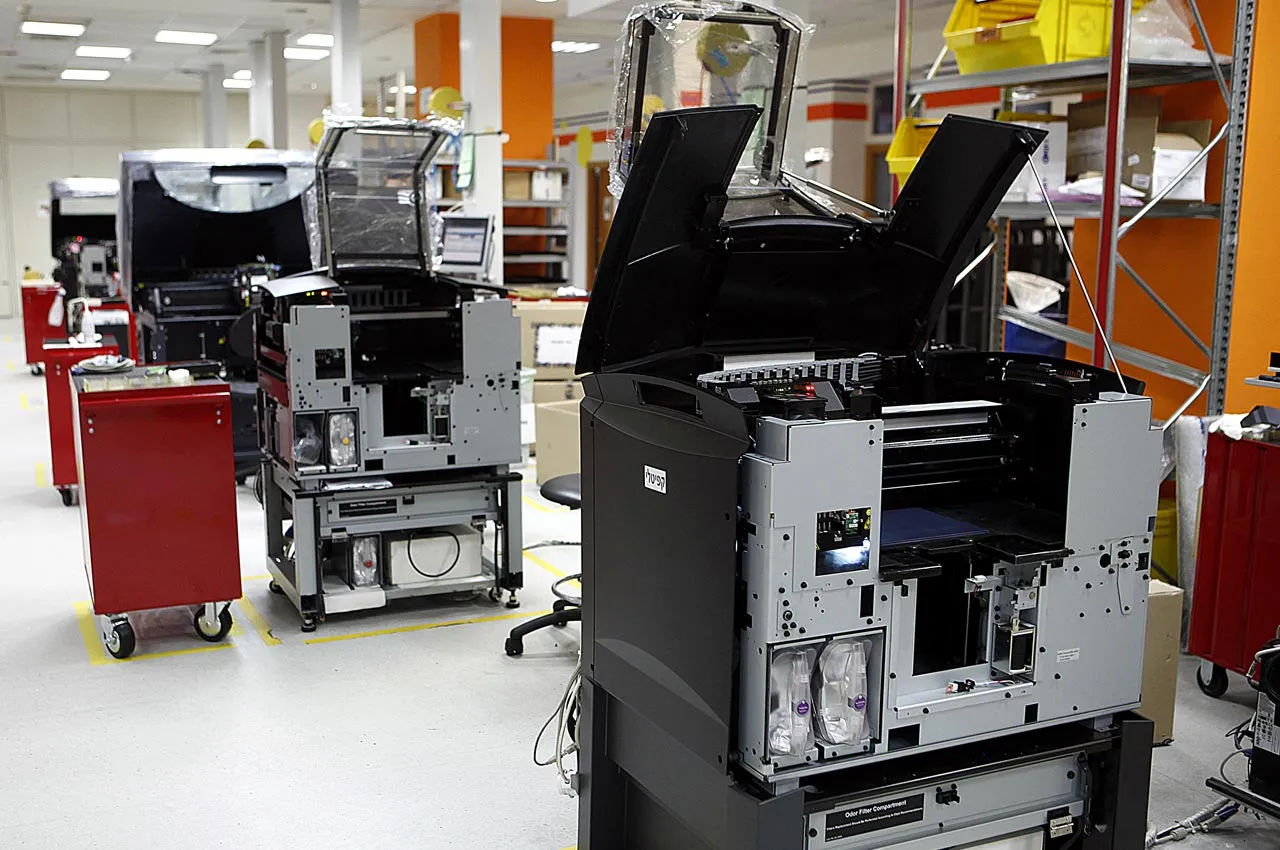 A collection of 3D digital printers on the production line during the final stages of assembly at the Stratasys Ltd. factory in Rehovot, Israel, on July 28, 2013. Photographer: Ariel Jerozolimski/Bloomberg