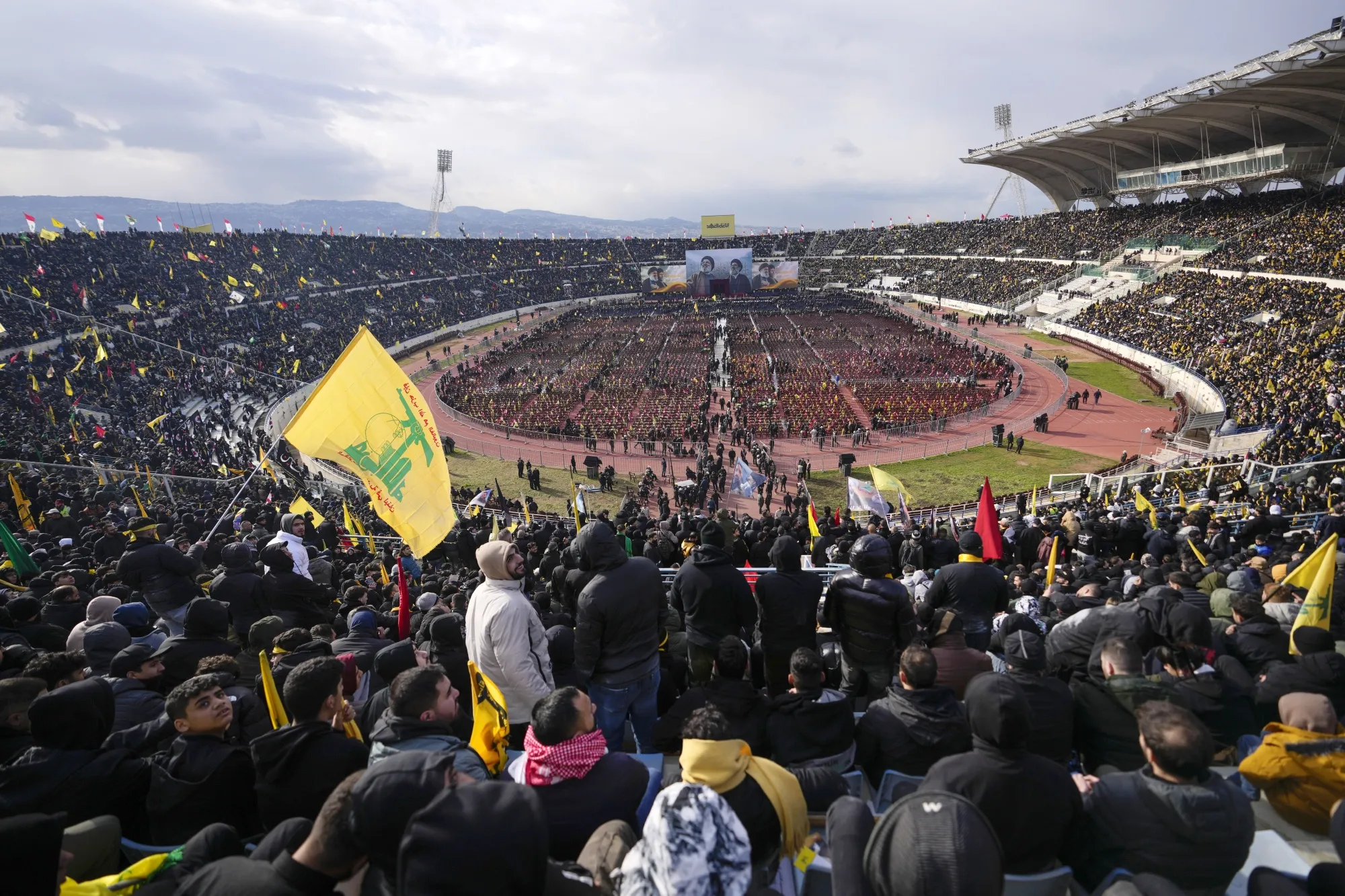 People gather for the funeral ceremony of Hassan Nasrallah and Hashem Safieddine at the Sports City Stadium in Beirut, on Feb. 23.