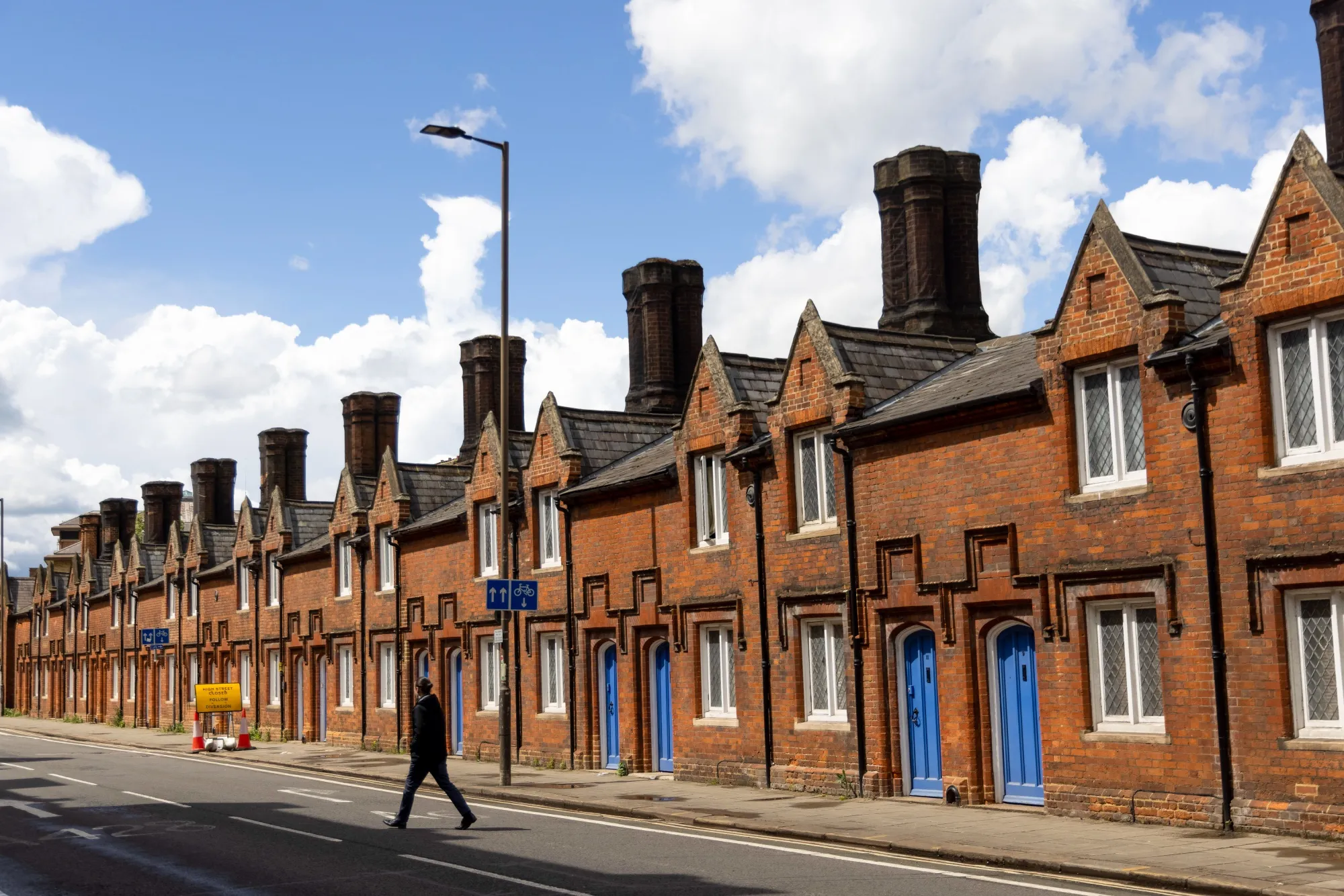 A pedestrian crosses the road&nbsp;in Bedford, U.K., on&nbsp;May 24.&nbsp;